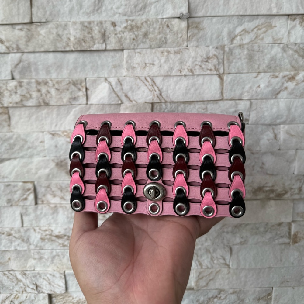 Coach Pink and Black Woven Clutch